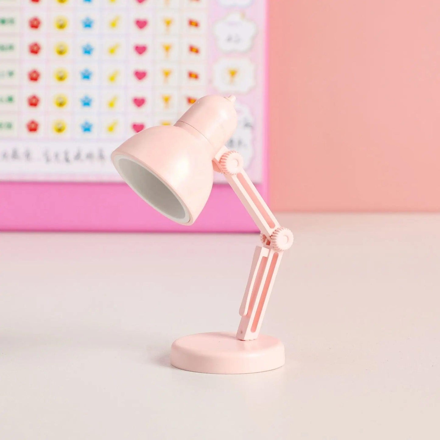 Petite lampe de bureau pliable rose