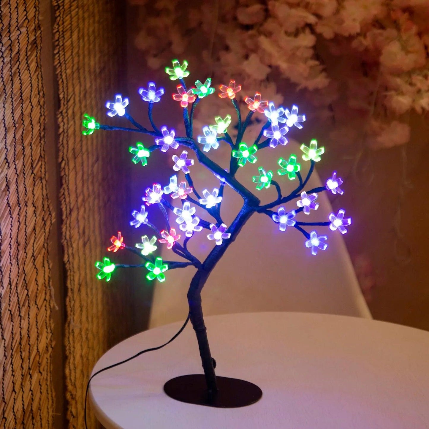cerisier lumineux led multicolore sur une table