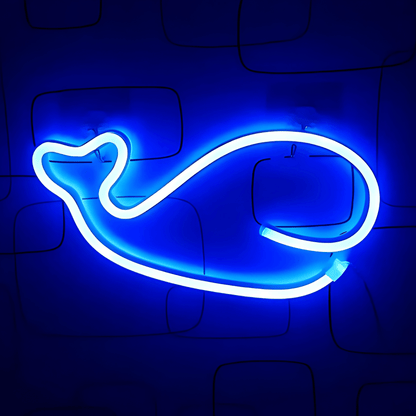 néon décoratif baleine sur un mur