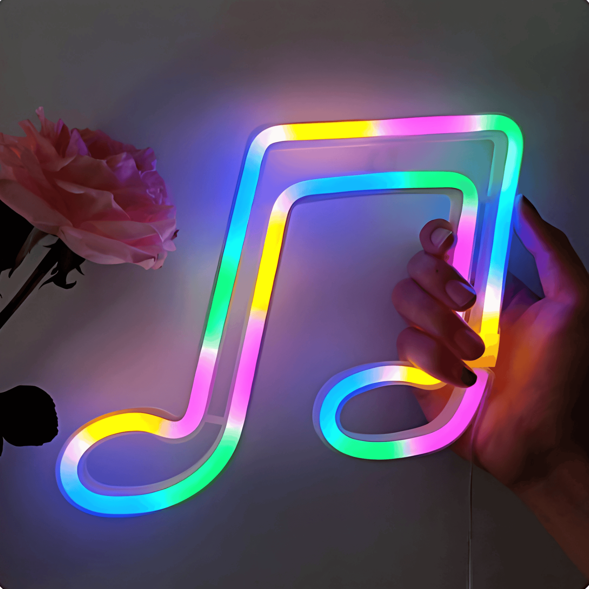 néon musique dans une main